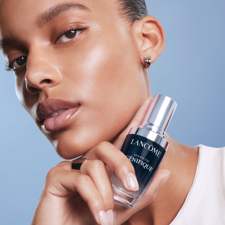 Model holding Advanced Youth Activating Genifique Serum